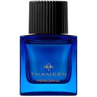 Blue glass bottle of Thameen Peregrina Extrait de Parfum with black ribbed cap and gold logo.