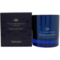 Thameen Sandalwood Vert Candle 250g in a deep blue glass jar with matching dark blue box featuring gold text.