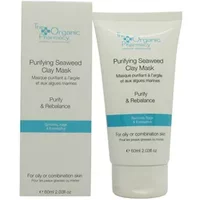 White tube of Purifying Seaweed Clay Mask with blue accents, next to matching box, 60ml by The Organic Pharmacy.