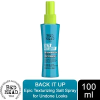 Blue TIGI Bed Head salt spray bottle with green cap, labeled "Salty Not Sorry Texturising Salt Spray 100ml."