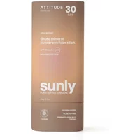 Tinted sunscreen Attitude Sunly SPF 30 in a sleek brown tube with white text and minimalist design.