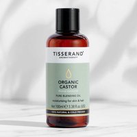 Tisserand Organic Castor Oil bottle, 100ml, with black cap and green label, for skin and hair.