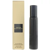 Black cylindrical Tom Ford Black Orchid Eau De Parfum 10ml bottle with gold box packaging.