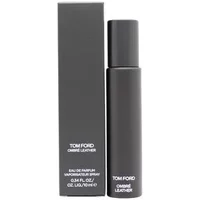 Tom Ford Ombre Leather Eau De Parfum 10ml, sleek black cylindrical bottle with matching rectangular box.