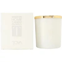 Tova Beverly Hills Signature Candle 226g in white glass jar with gold lid, next to matching white box.