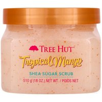 Tree Hut Shea Sugar Scrub in a clear jar with orange lid, labeled "Tropical Mango" in yellow and green text.