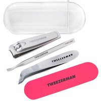 Tweezerman Mini Neon Nail Rescue Kit with silver clippers, tweezers, cuticle pusher, pink nail file, and clear case.