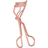 Rose gold eyelash curler with ergonomic handles and cushioned pad by Tweezerman.