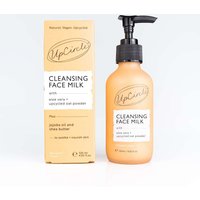 Amber pump bottle of UpCircle Cleansing Face Milk with matching box, featuring black text and logo.