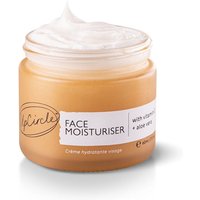 Amber jar of UpCircle Face Moisturiser with Vitamin E, white label, black text, cream texture visible on top.