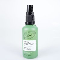 Green bottle of UpCircle Hand & Body Wash with black pump, labeled lemongrass, 50ml travel size.