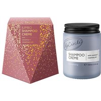 Purple UpCircle Jumbo Shampoo Crème jar with black lid, coconut and rosemary oil, next to a geometric pink box.