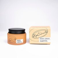 UpCircle Night Cream in amber jar with black lid, next to beige box labeled with brand logo and product details.