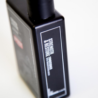 Uppercut Deluxe Strength & Restore Conditioner, black rectangular bottle with white text and flip-top cap, 240ml.