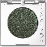Urban Decay 24/7 Eyeshadow Mono-Psych, shimmery dark green in a clear square compact with brand name on the side.