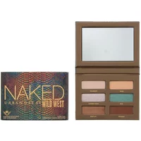Urban Decay Naked Wild West Eyeshadow Palette with six shades in a brown case and a mirror.