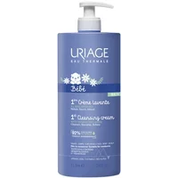 Uriage Bebe 1st Cleansing Cream 1000ml, blue bottle with pump, white floral design and baby icon.