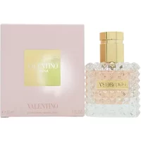 Valentino Donna Eau De Parfum 30ml with studded glass bottle and gold cap, next to pink box with gold accents.