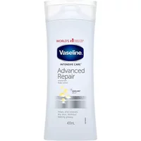 Vaseline Intensive Care Advanced Repair lotion, white bottle, blue logo, 200ml, unscented, with healing micro-droplets.