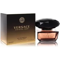 Versace Crystal Noir Eau De Parfum 50ml with dark faceted cap and amber glass bottle beside black and gold box.