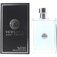 Clear glass bottle with silver cap, light blue liquid, and Versace logo next to black box with silver detailing.
