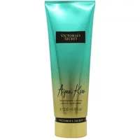 Aqua Kiss body lotion, teal and gold tube, black cap, Victoria's Secret logo, 236ml.
