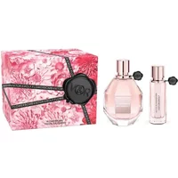 VIKTOR&ROLF Flowerbomb gift set with pink hexagonal bottle, small spray, and floral pink box with black seal.