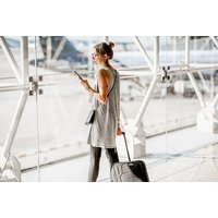 VIP Airport Lounge Discounts card with Priority Booker logo, featuring airport lounge imagery and travel icons.