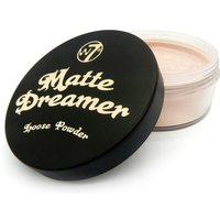 Black lid W7 Matte Dreamer Loose Powder container with gold lettering, translucent pink powder visible inside.