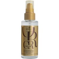 Clear bottle of Wella hair oil with gold label and pump dispenser, featuring "Oil Reflections" text.