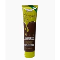 Green and brown tube of Xpel Hair Care Argan Oil Shampoo 300ml with leaf design and gold lettering.