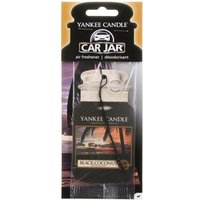 Yankee Candle Car Jar Black Coconut air freshener, black jar shape with tropical sunset label, hanging string attached.