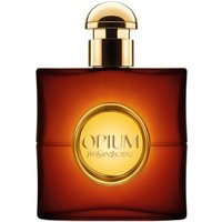 Amber YSL Opium Pour Femme Eau de Toilette bottle with gold cap and circular gold label.