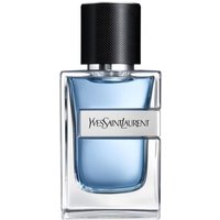 Clear glass bottle with blue liquid, black textured cap, and Yves Saint Laurent logo on front.