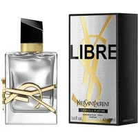 Clear glass bottle with gold accents and black cap, next to a silver and black box labeled "Libre" by Yves Saint Laurent.