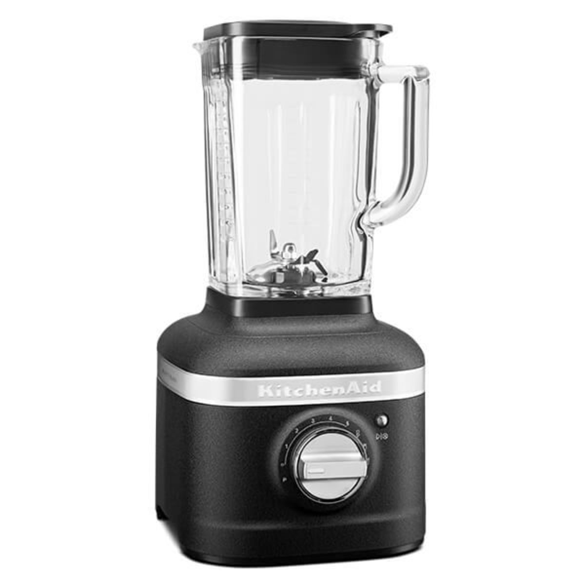 1.4L KitchenAid K400 ARTISAN Blender in cast iron black with a glass jar, stainless steel blade, and a silver control dial, accompanied by a citrus press attachment.