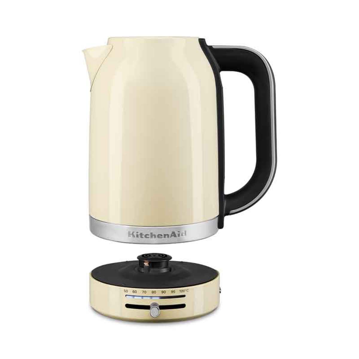 Almond cream-colored KitchenAid kettle with a black handle, featuring a variable temperature dial and a stainless steel base, designed for 1.7L capacity.
