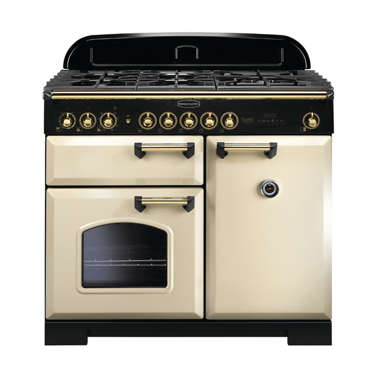 Classic Deluxe 100cm dual fuel range cooker in cream with brass trim, featuring a black control panel, multiple burners, and two ovens with a glass window.