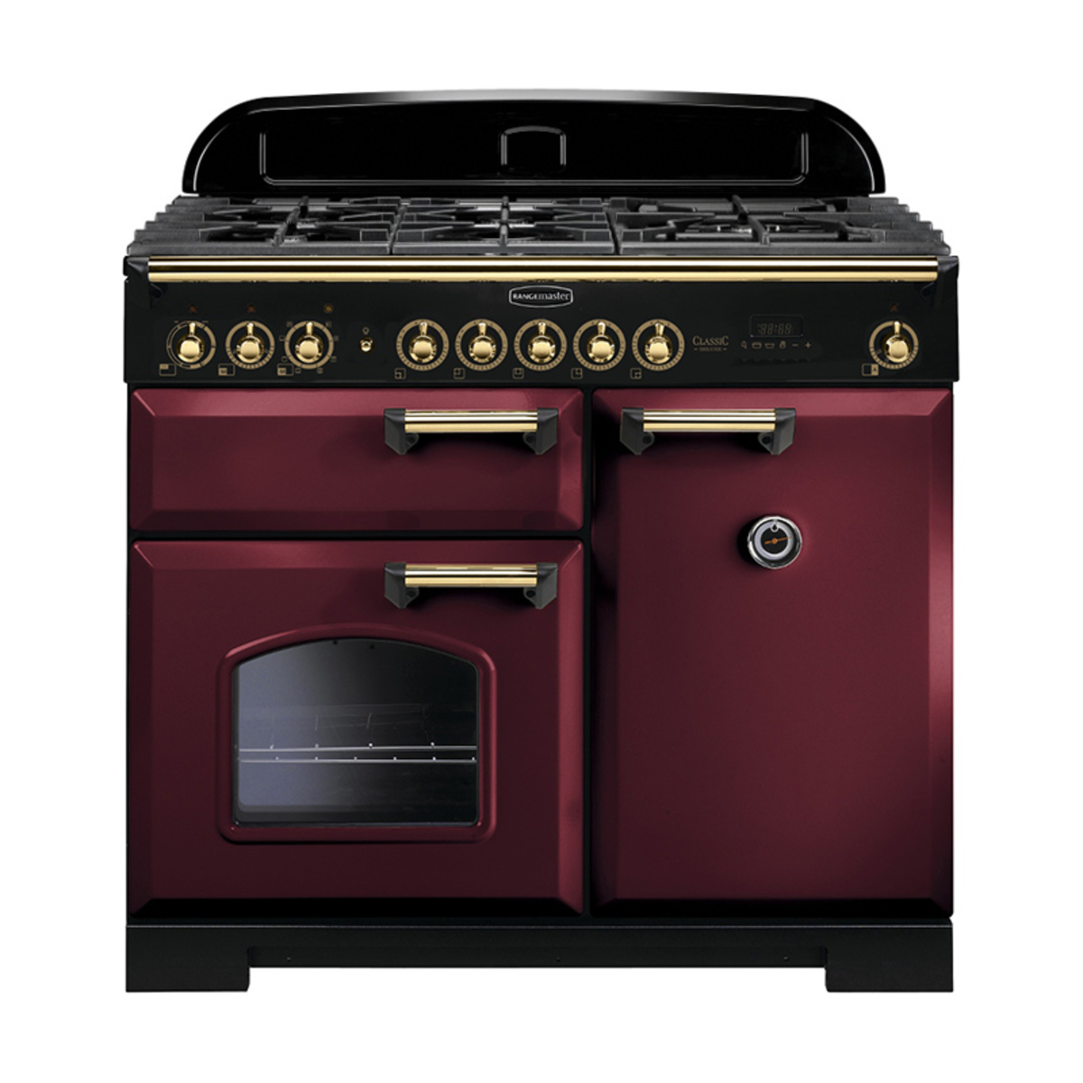 Classic Deluxe 100cm dual fuel range cooker in cranberry with brass trim, featuring a black gas hob, multiple control knobs, two ovens, and a stylish design.