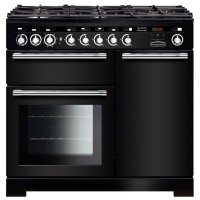 Black dual fuel range cooker with chrome trim, featuring six gas burners, dual ovens, and control knobs along the front.