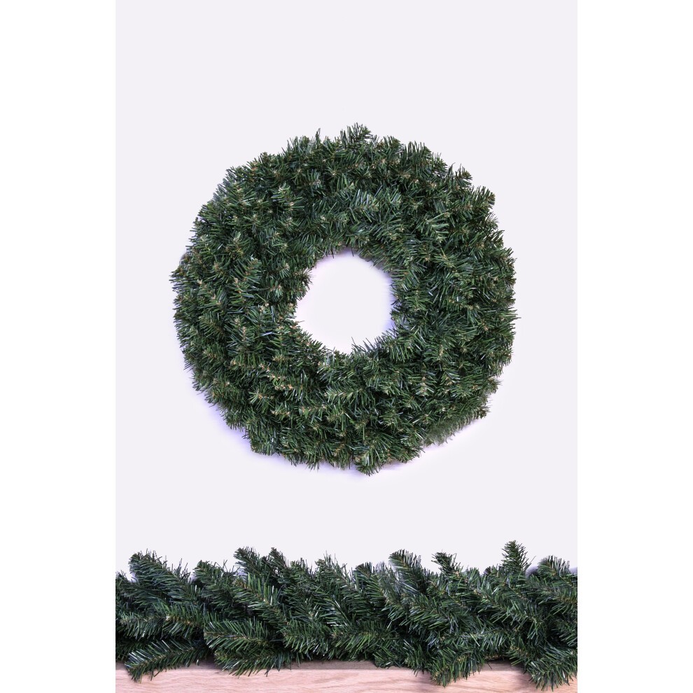 Extra wide, lush green Arbor Vitae wreath measuring 120cm, featuring a full, realistic design with a central opening, displayed against a light background.