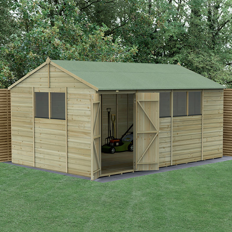 A wooden shed with a green apex roof, featuring double doors, shiplap cladding, and windows, set in a grassy area surrounded by trees and wooden fencing.