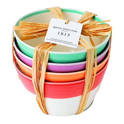 Set of four Royal Doulton 1815 cereal bowls in bright colors: mint green, lavender, coral, and white, tied together with natural straw and featuring a smooth ceramic finish.