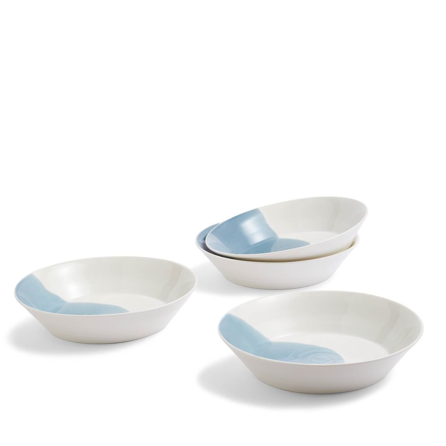 Set of four Royal Doulton 1815 Signature Blue pasta bowls featuring a smooth white ceramic finish with a soft blue accent on one side.