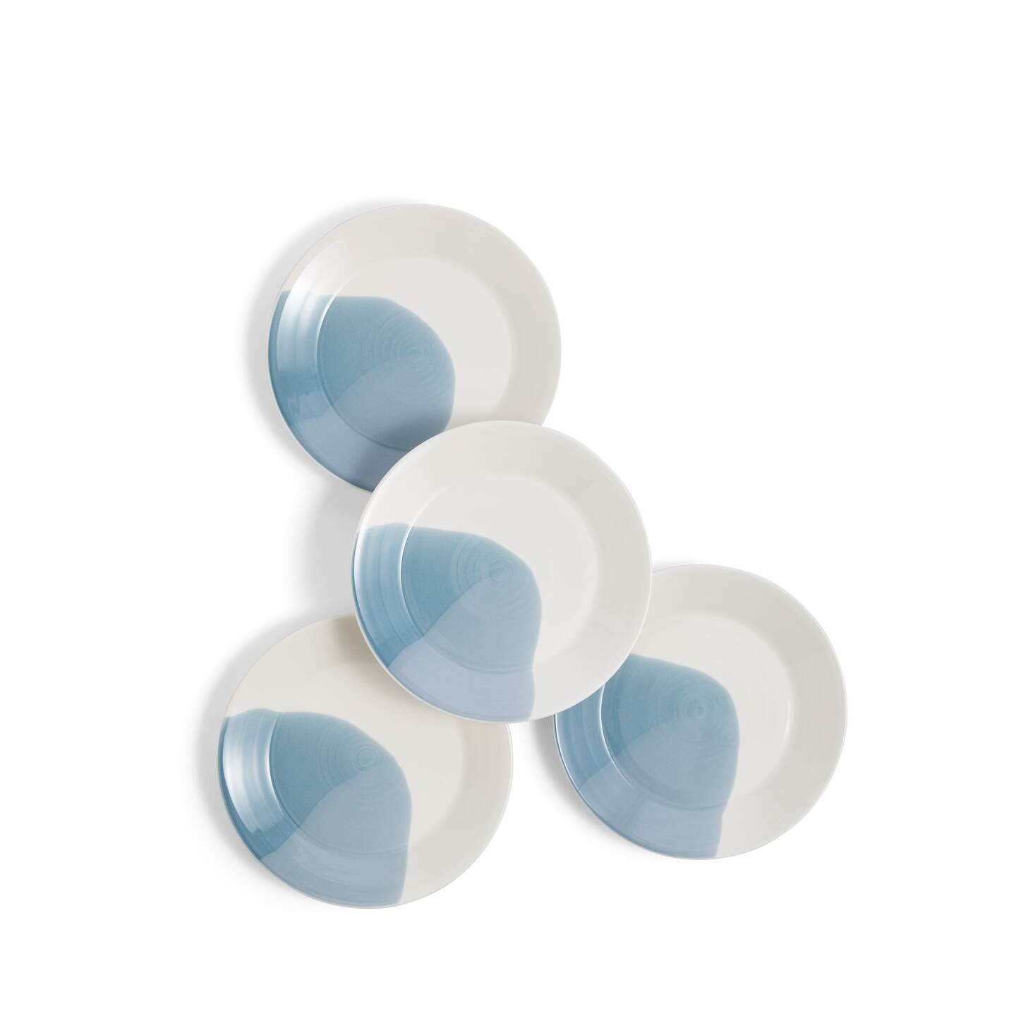 Set of four Royal Doulton 1815 Signature side plates featuring a smooth white surface with a distinctive blue glaze accent on one side.