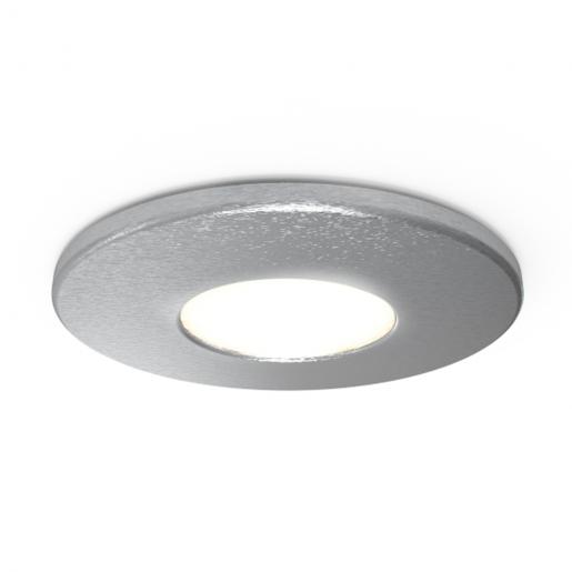 Satin chrome LED downlight bezel with a smooth, circular design and a central light opening, featuring a sleek, modern finish suitable for various settings.