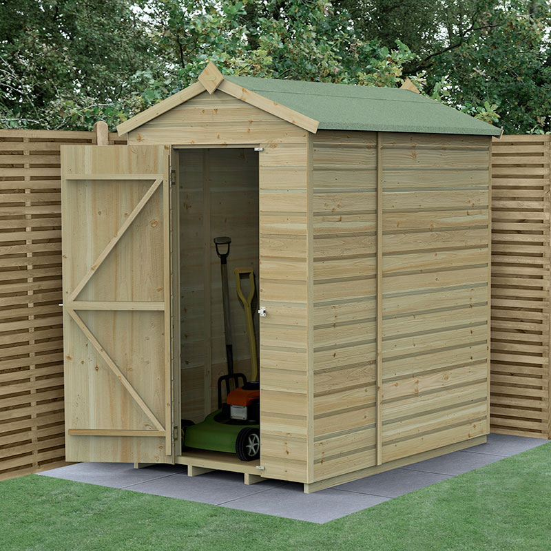 A wooden apex shed with a green felt roof, featuring shiplap cladding, an open door revealing a lawn mower, and a pressure-treated finish, set against a wooden fence.