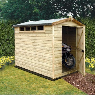 A wooden garden shed with a natural finish, featuring an apex roof, double doors, and a window, set in a grassy area with yellow flowers and a motorcycle partially inside.