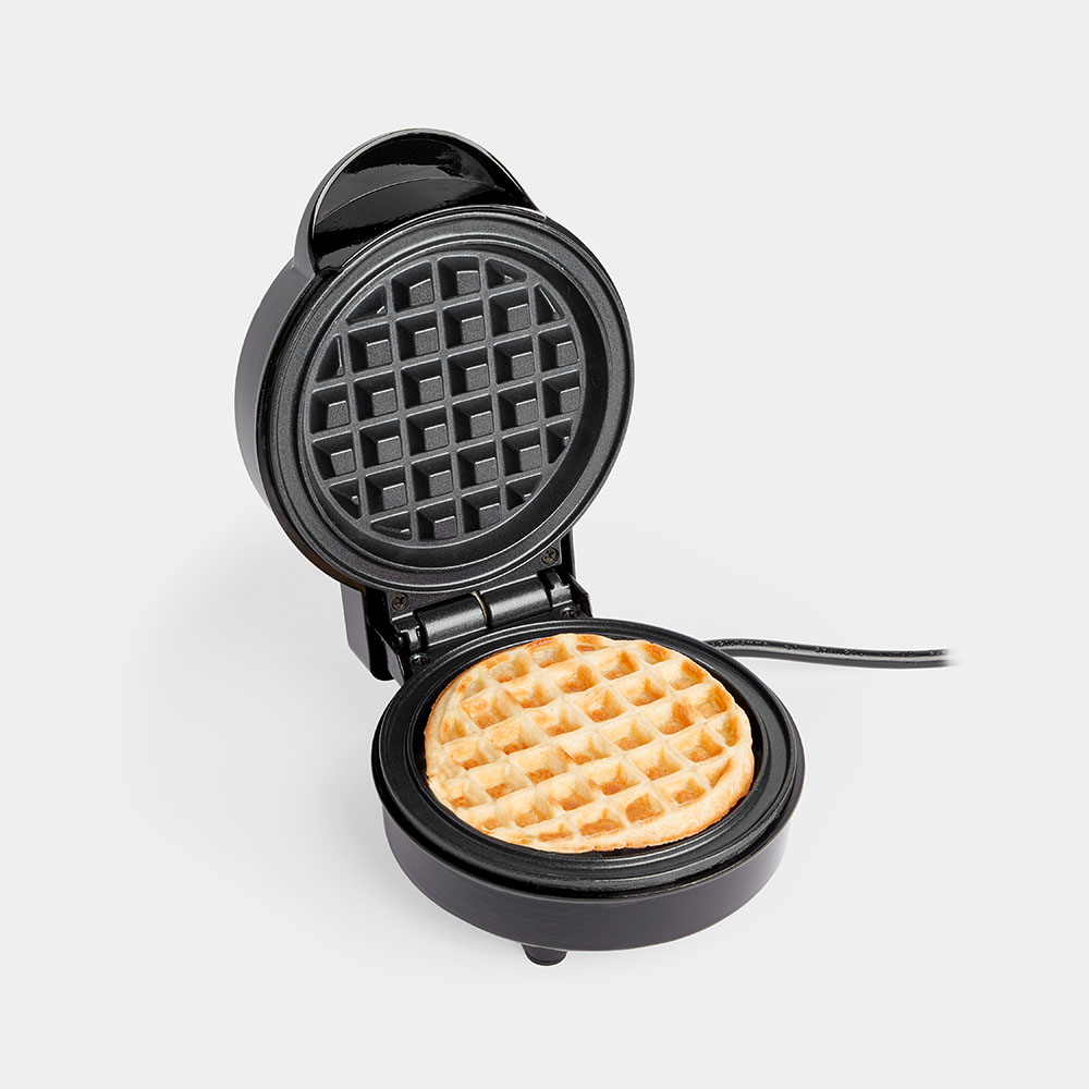 Compact black mini waffle maker with a non-stick cooking surface, featuring a grid pattern for perfect waffles, and a 600w power indicator.