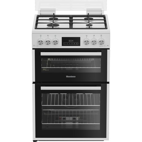 White freestanding double oven gas cooker with a stainless steel control panel, four gas burners on top, and two black glass oven doors featuring internal racks.